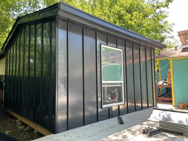 Black standing seam metal wall panels for Metal Roof Installation in Cape Elizabeth